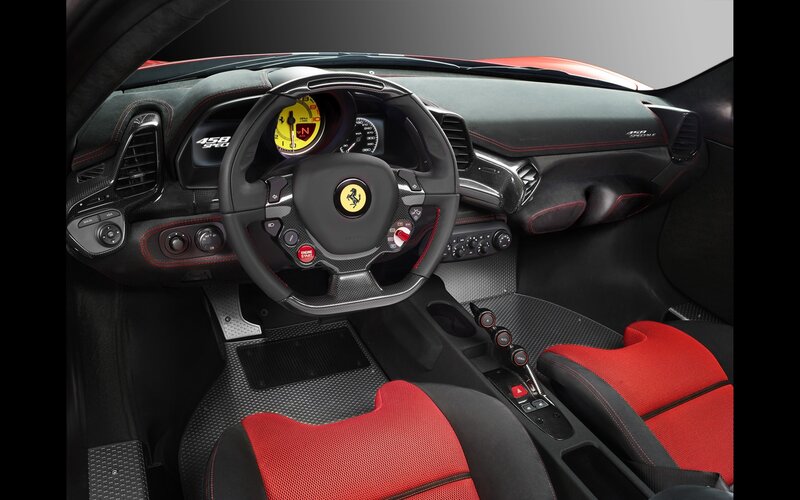 Interior of a Sports Car — Black, Sleek, Photograph, Steering Wheel, Dashboard, Red Seats