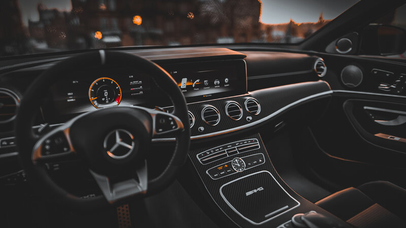 Interior of Luxury Car — Black, Dramatic, Sunset