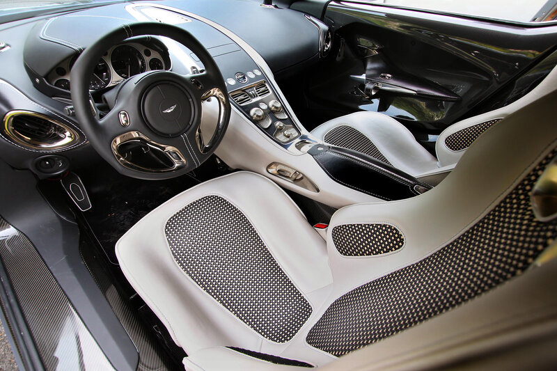 Interior of Luxury Car — Black, Sleek, Modern, Photograph, Steering Wheel, Dashboard