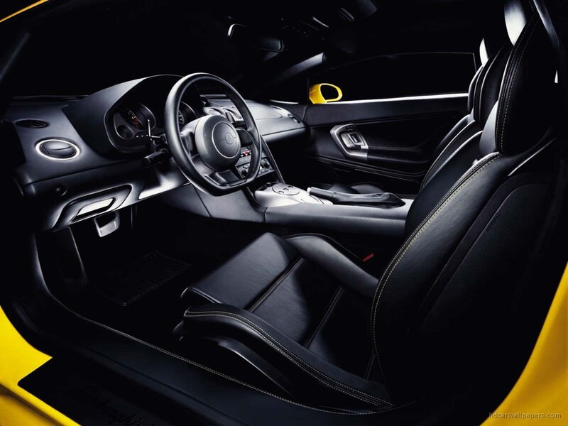 Interior of Sports Car — Black, Dramatic, Photograph, Steering Wheel