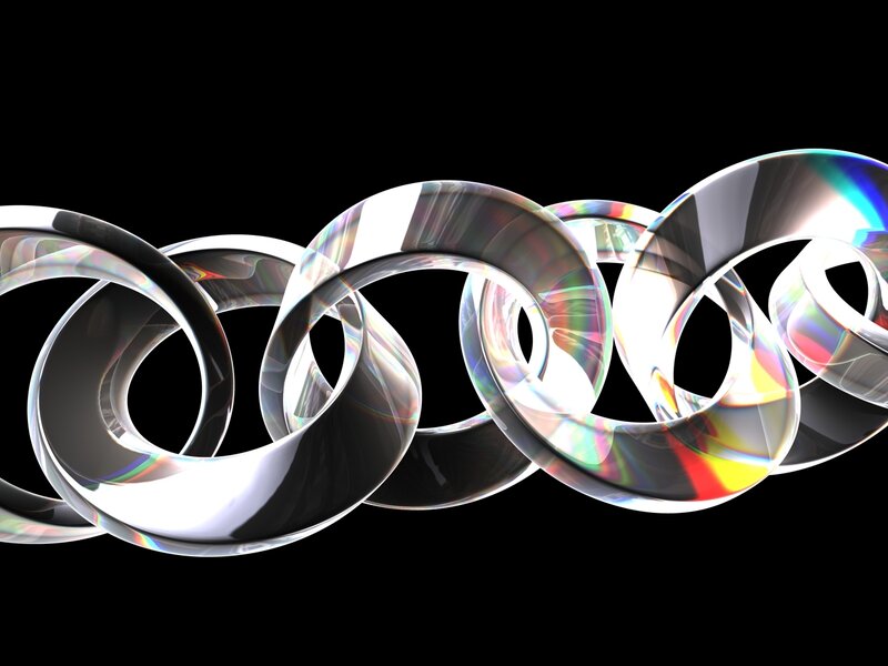 Interlocking rings with iridescent reflections