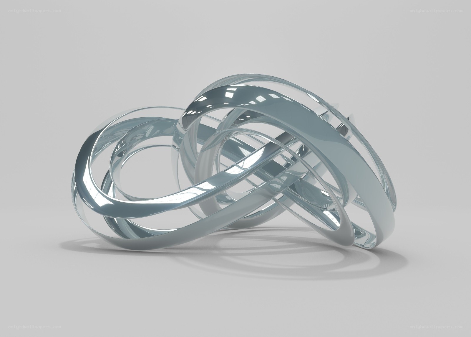 Interlocking silver rings sculpture