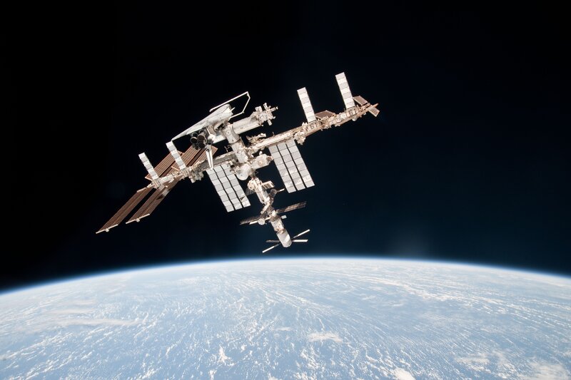 International Space Station — Blue, Serene, Photograph, Earth, Solar Panels, Spacecraft
