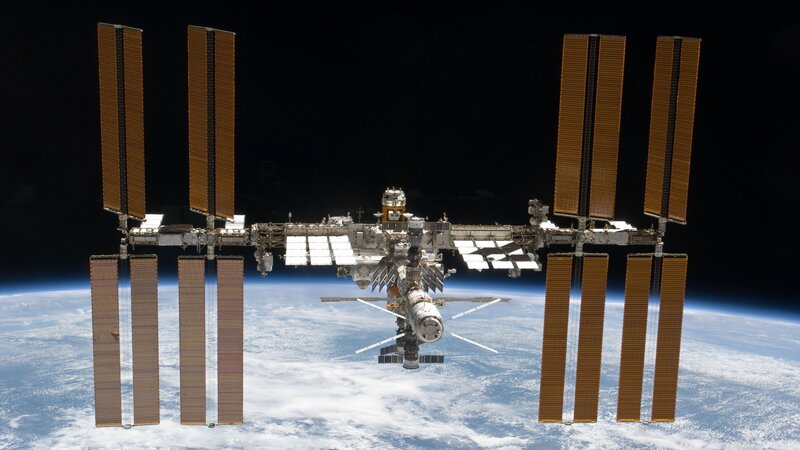 International Space Station — Blue, Serene, Photograph, Earth, Solar Panels, Spacecraft, White