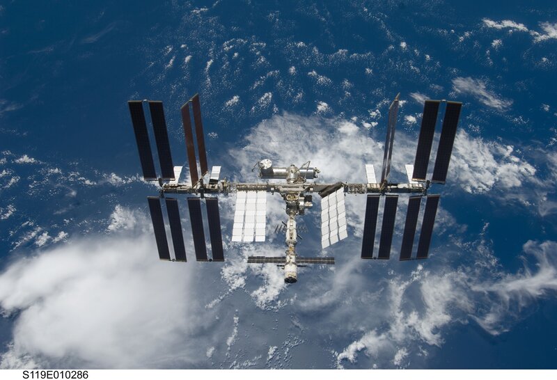 International Space Station — Blue, Serene, Photograph, Solar Panels, Earth, Clouds