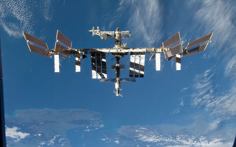 International Space Station — Blue, Serene, Photograph, Solar Panels, Earth