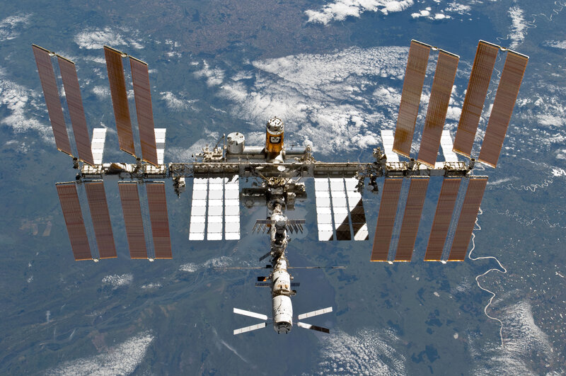 International Space Station — White, Serene, Photograph, Solar Panels, Earth