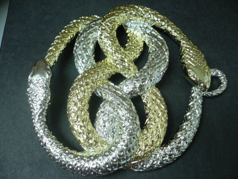 interwoven snake brooch