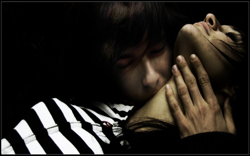 intimate embrace in darkness