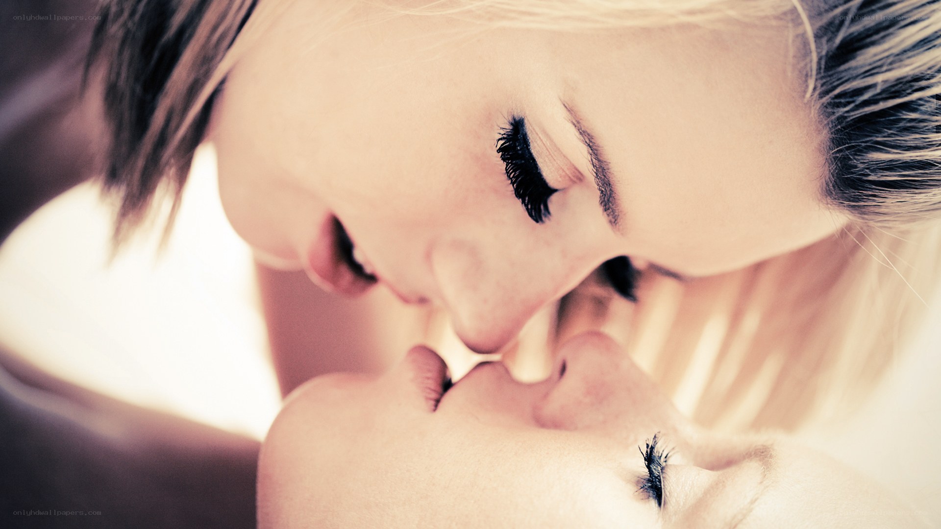 intimate moment between two women