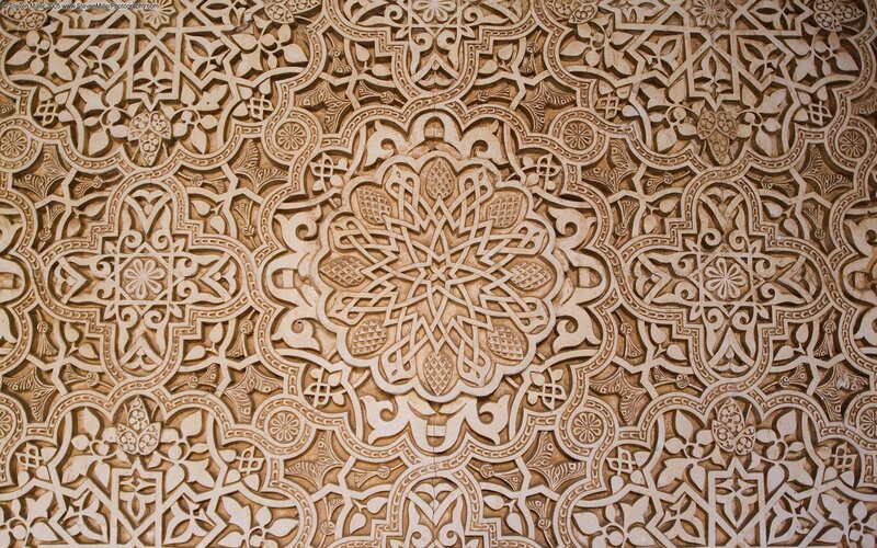 intricate arabesque wall carving