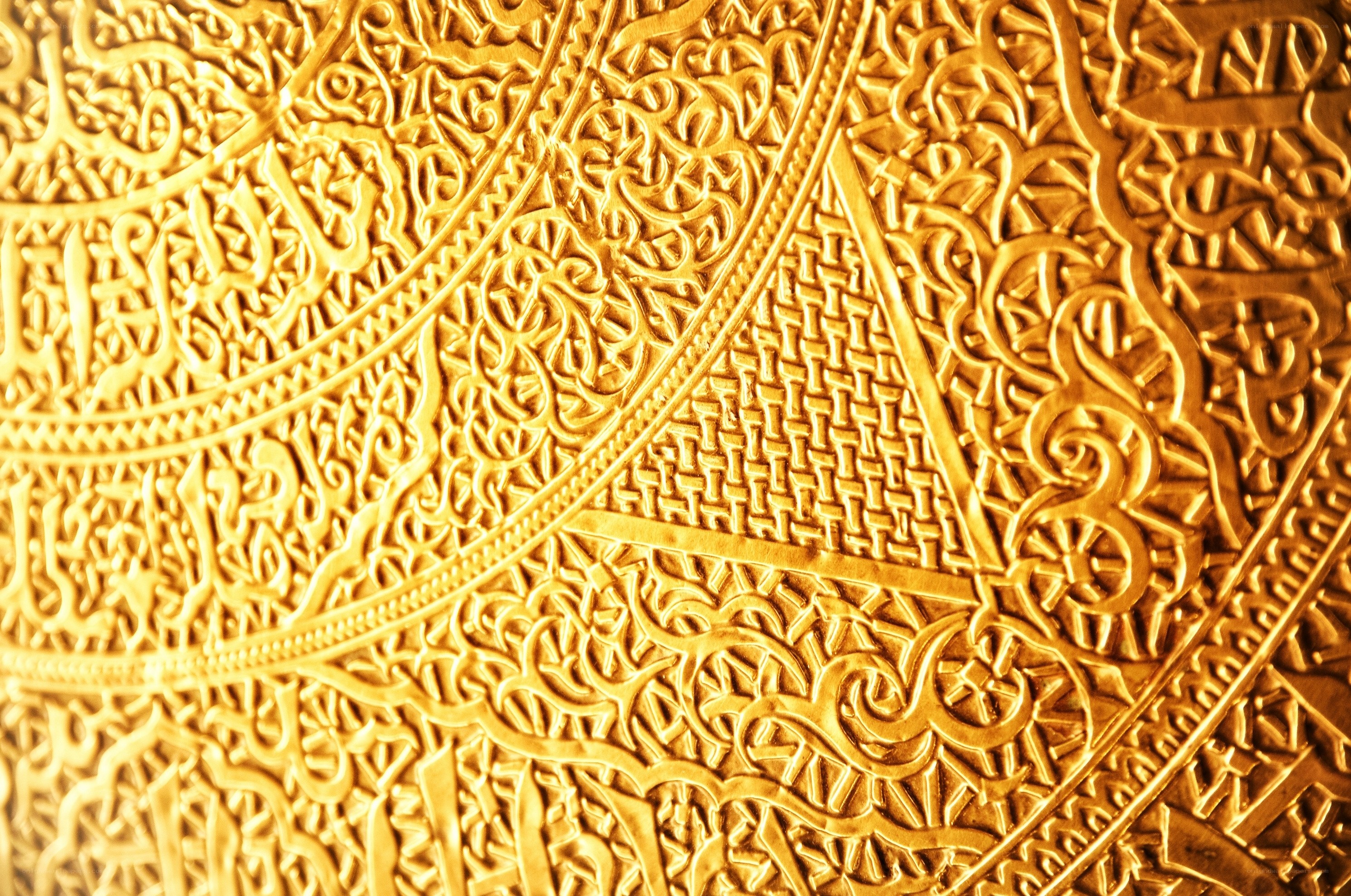 intricate golden arabic calligraphy