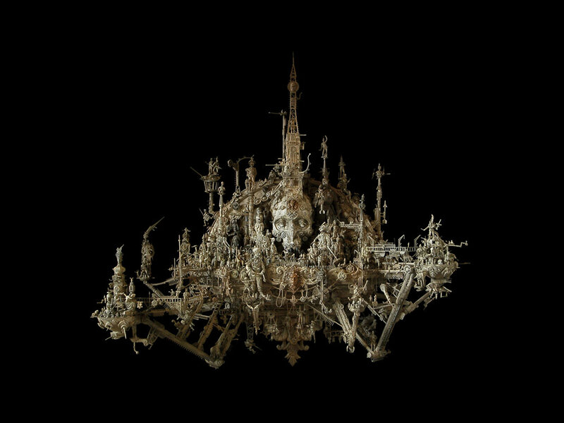 intricate sculpture with skull
