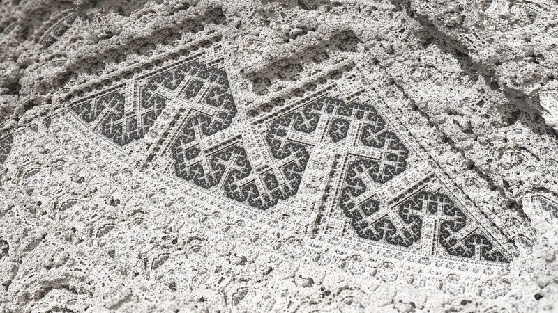 intricate stone carving pattern