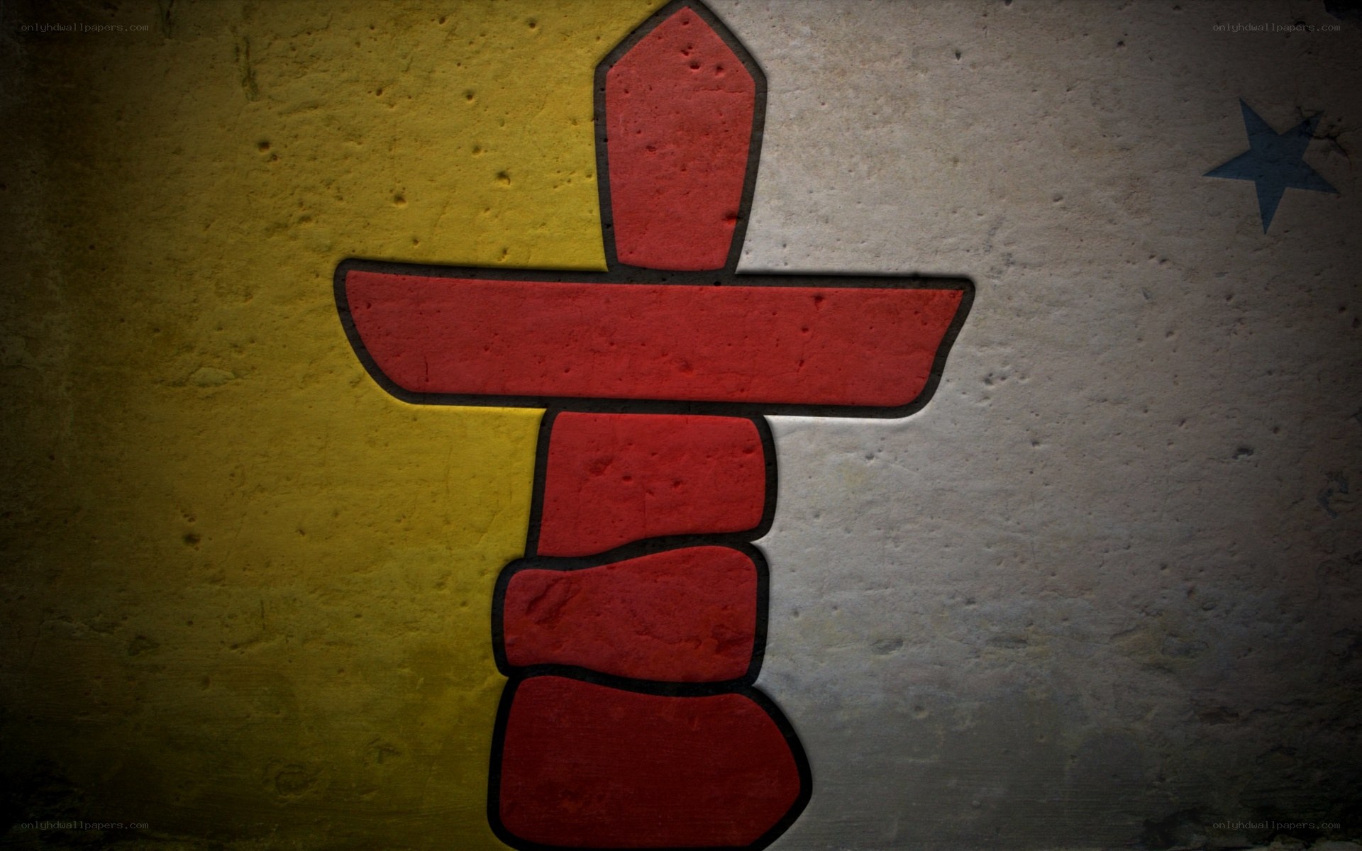 Inukshuk on textured wall