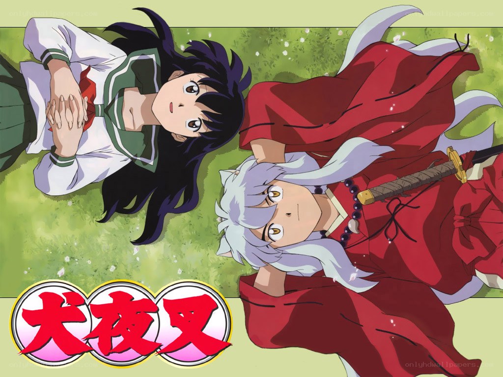 Inuyasha and Kagome lying on grass