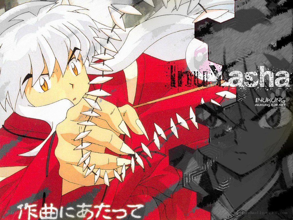 Inuyasha holding a weapon