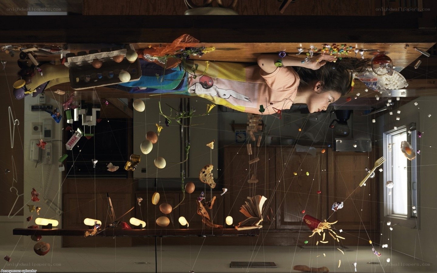 Inverted kitchen scene with floating objects