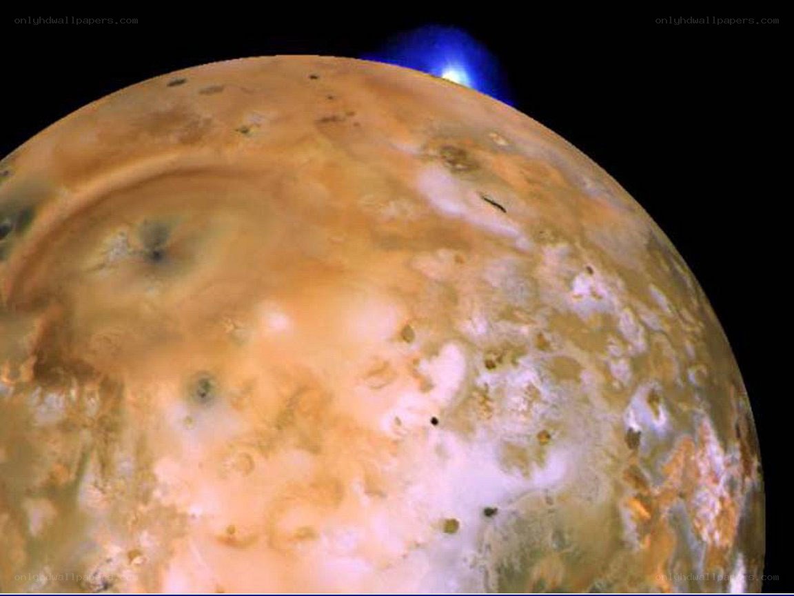 Io moon with volcanic plume