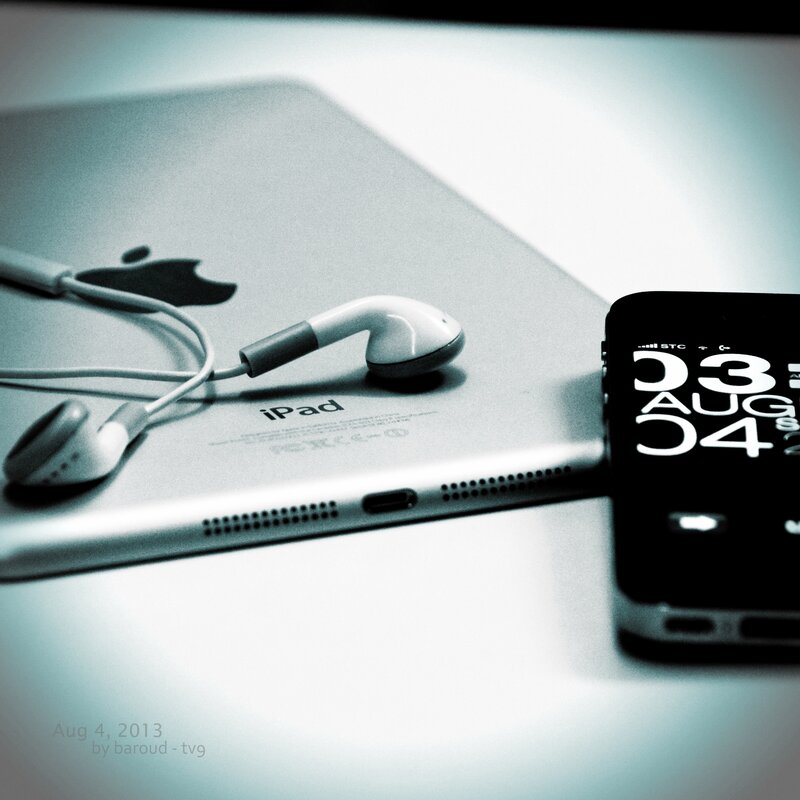 IPad and IPhone with Earphones — Gray