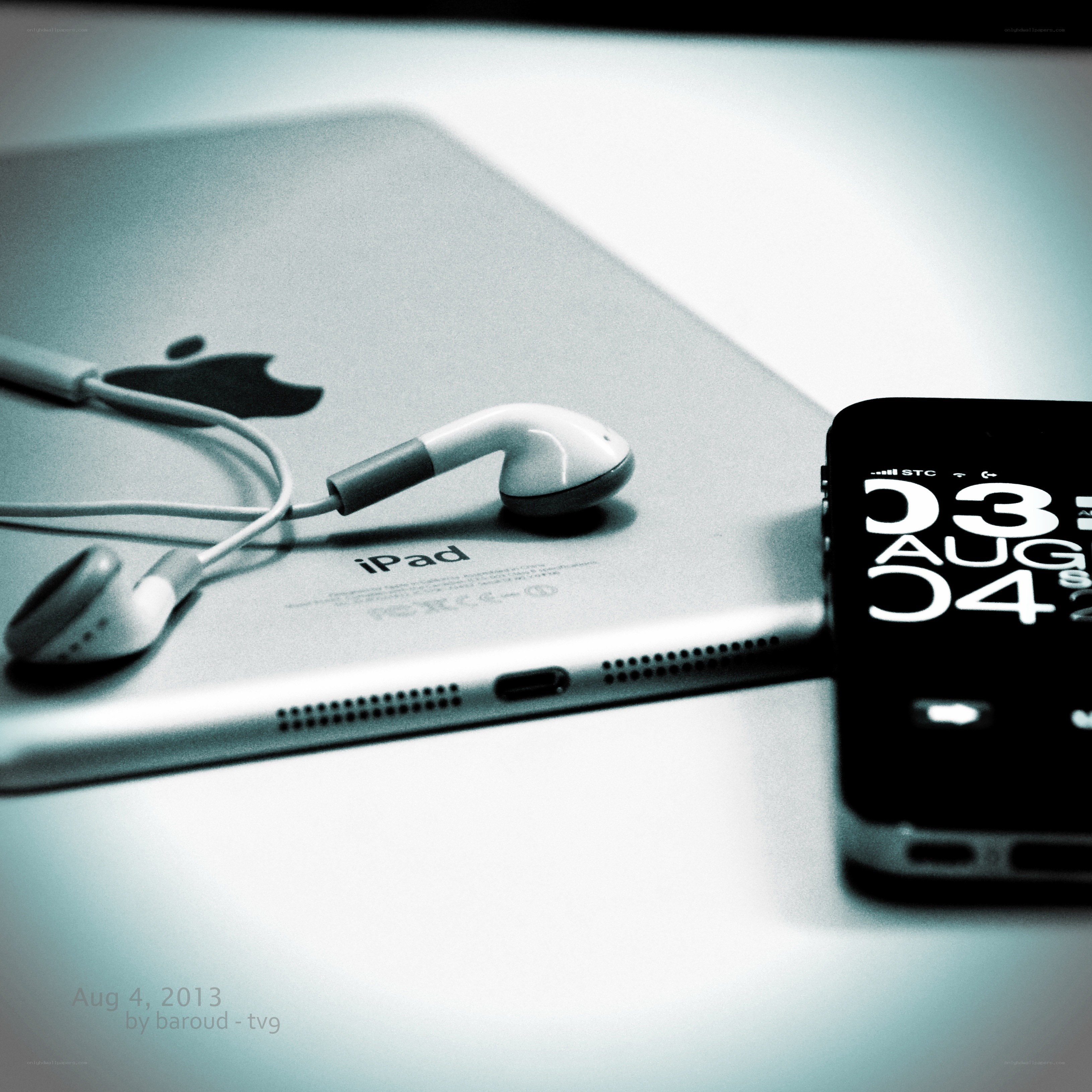 iPad and iPhone with earphones