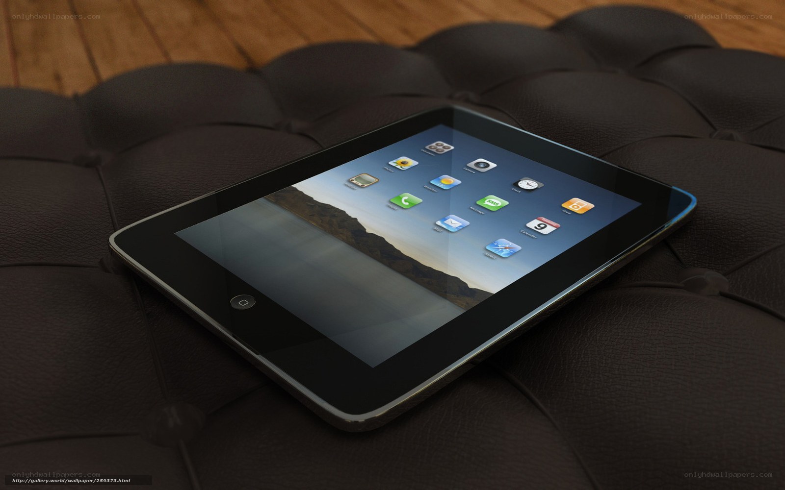 iPad on tufted leather ottoman
