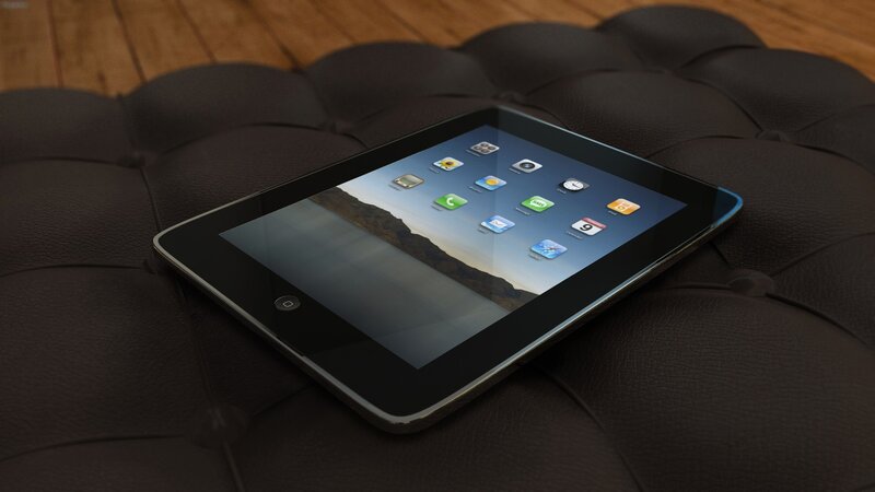iPad on tufted leather ottoman