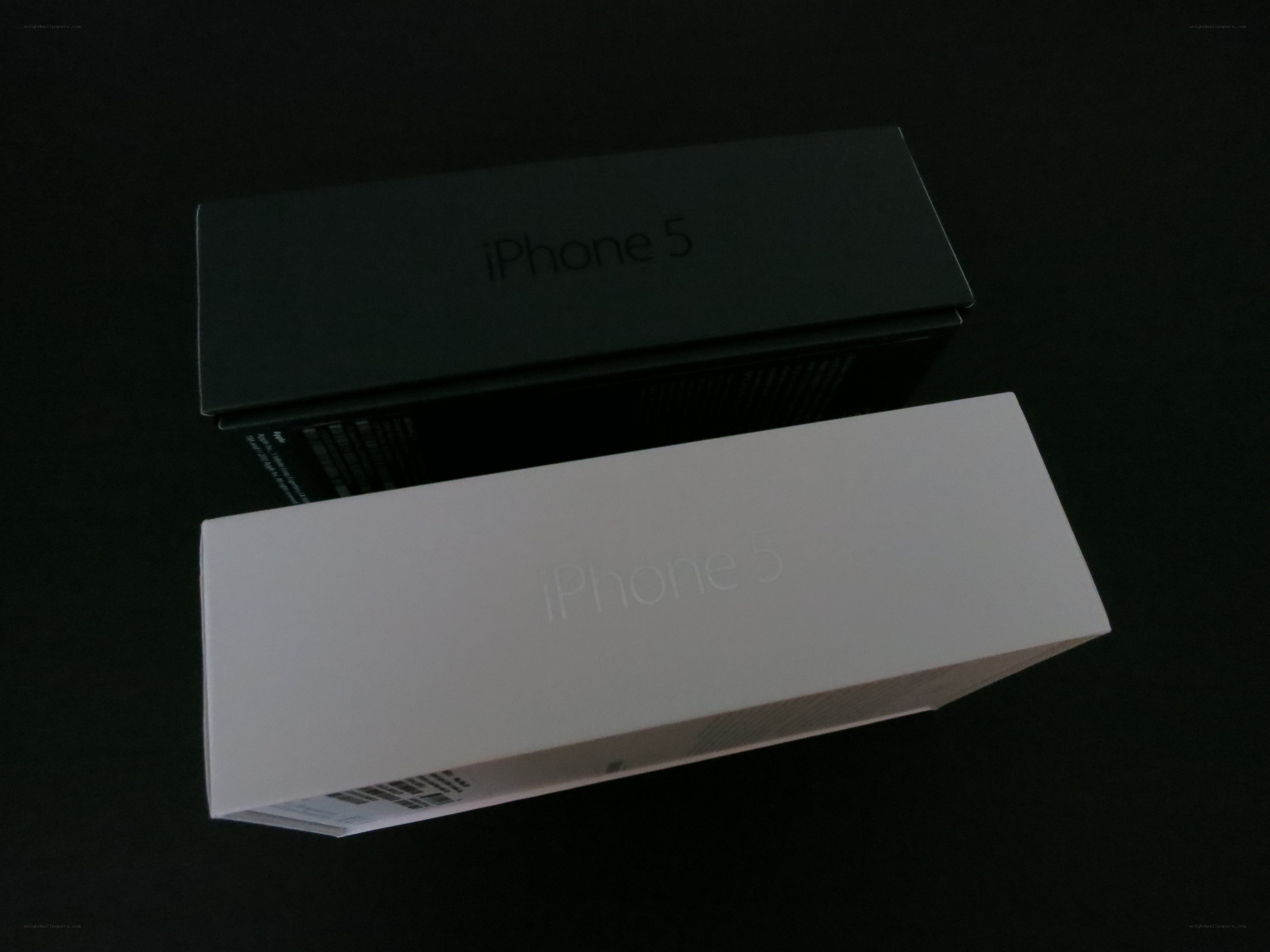 iPhone 5 boxes on black