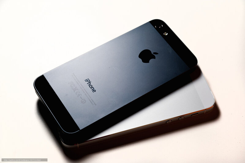 iPhone 5 on white surface