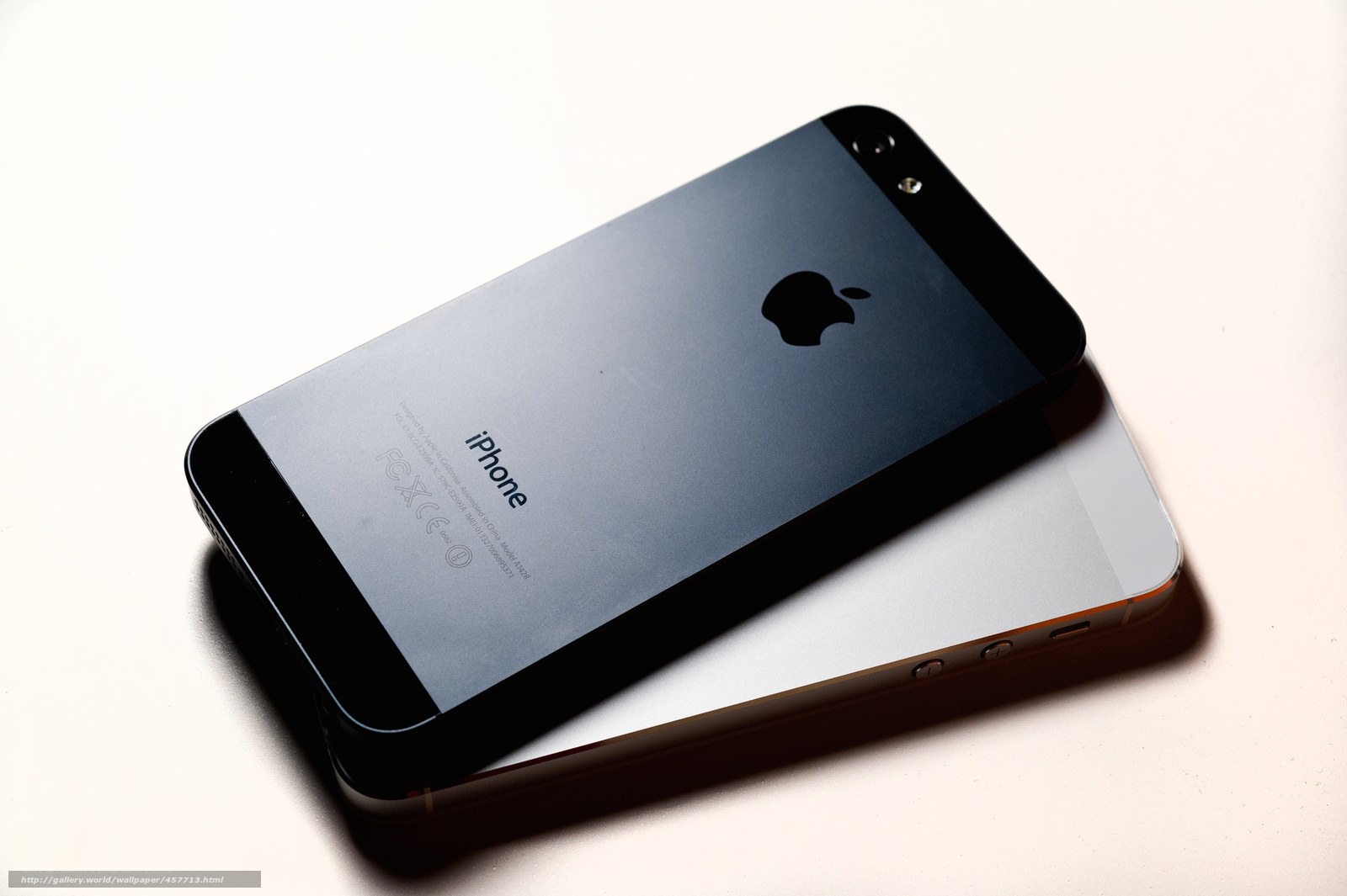 iPhone 5 on white surface