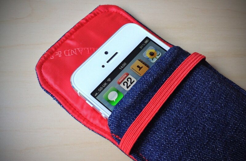 iPhone in denim pouch