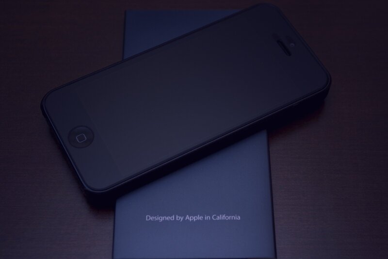 iPhone on box in dark room