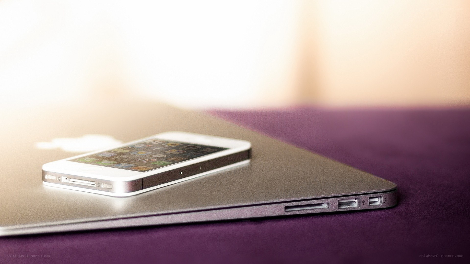 iPhone on laptop surface
