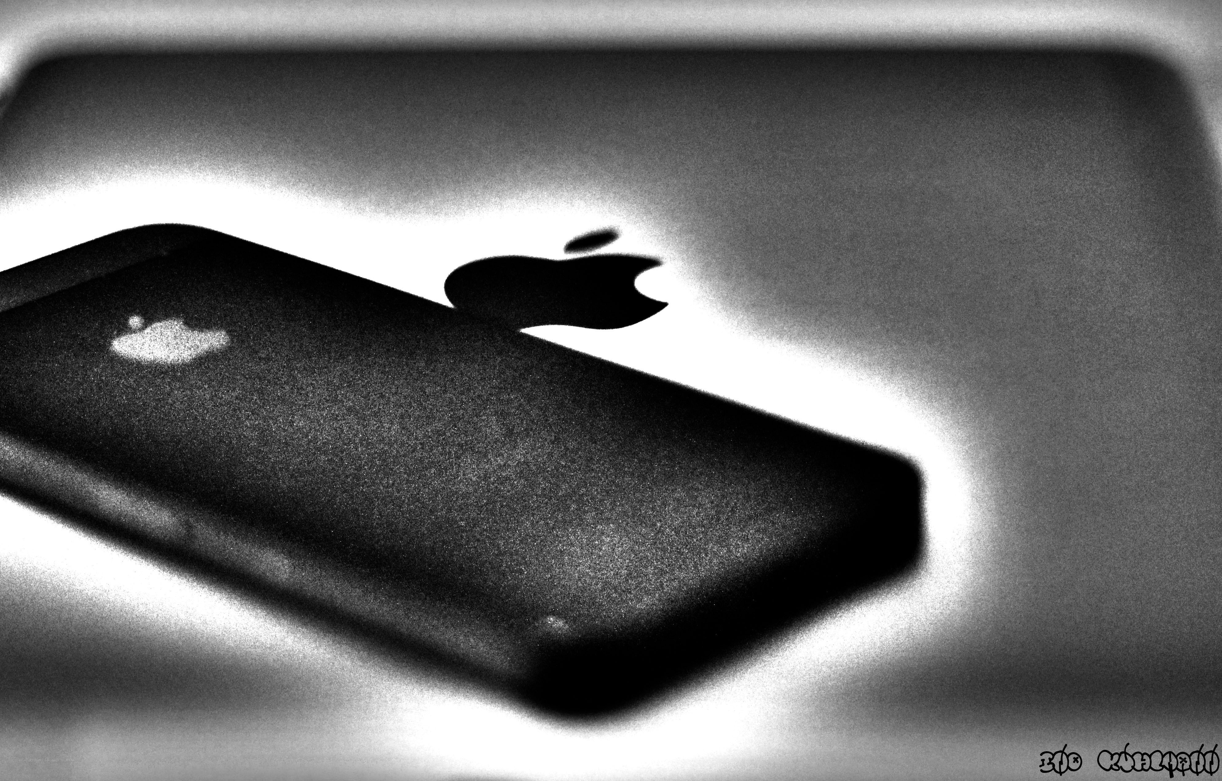 iPhone with Apple logo shadow
