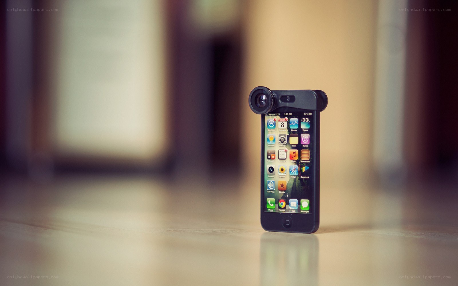 iPhone with camera lens attachment