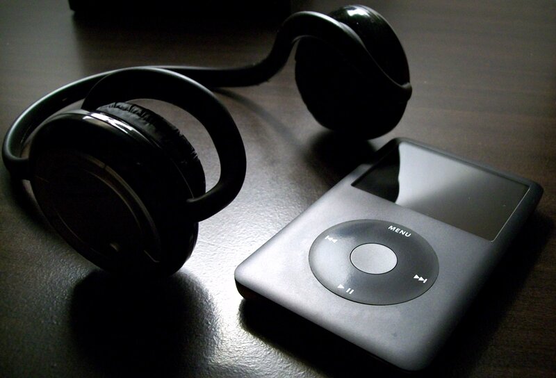 iPod and headphones on table