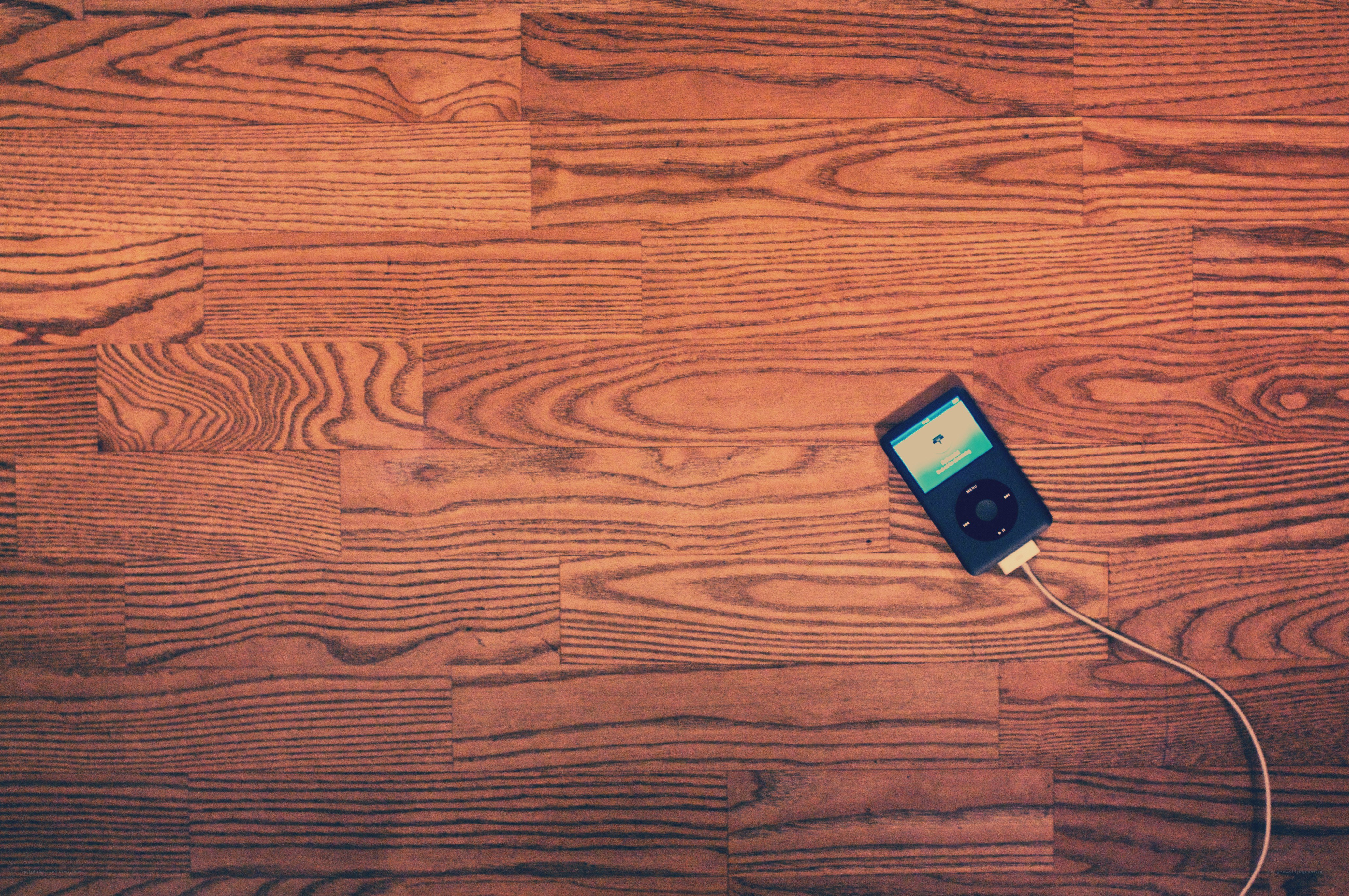 iPod on wooden floor