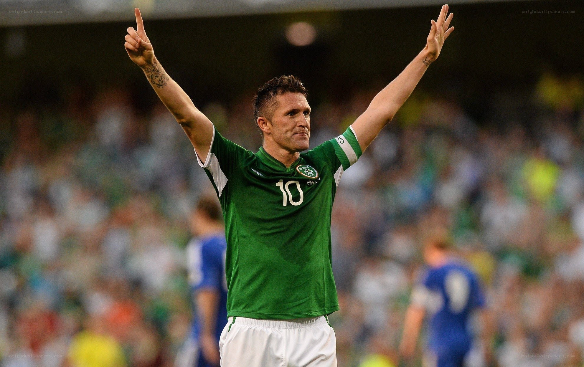 Irish footballer celebrating