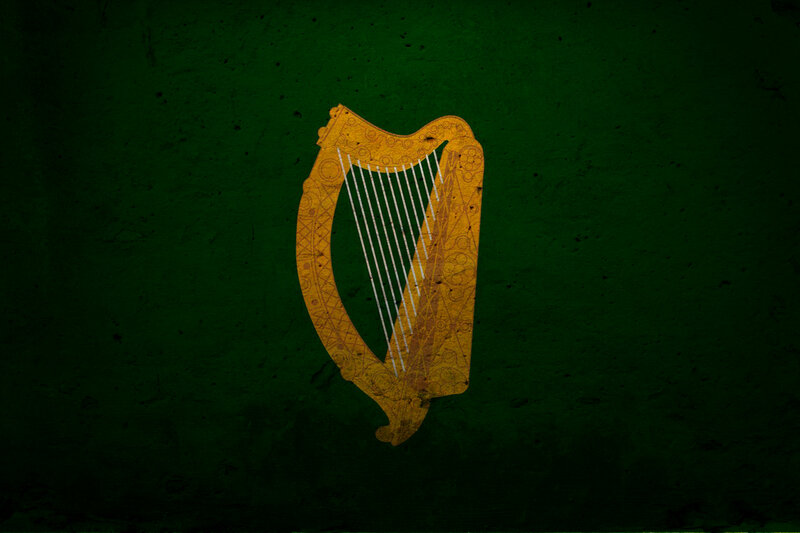 Irish harp on green background