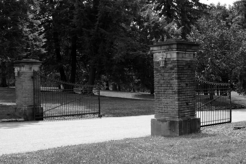 Iron Gates and Brick Pillars