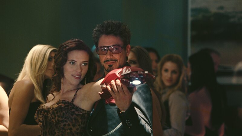 Iron Man and Pepper Potts at a party