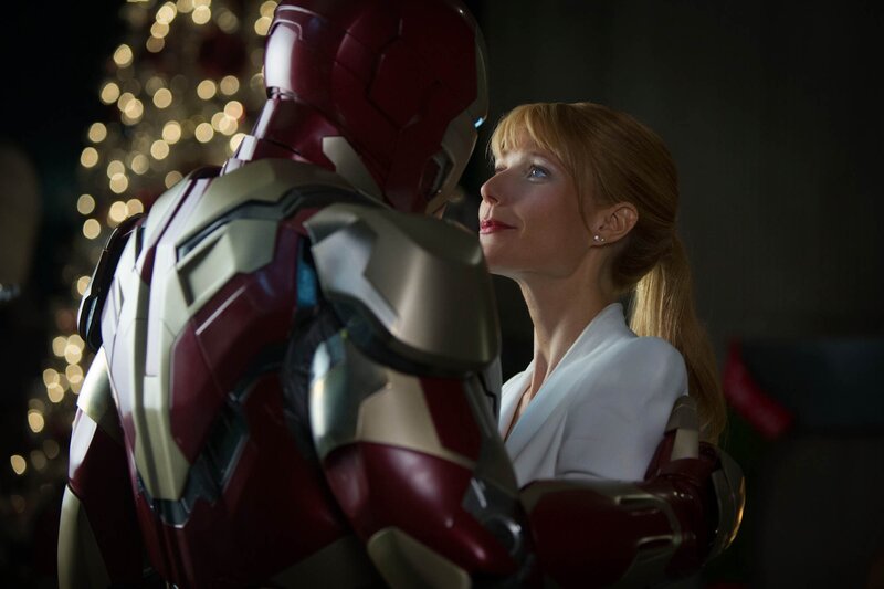 Iron Man and woman embrace