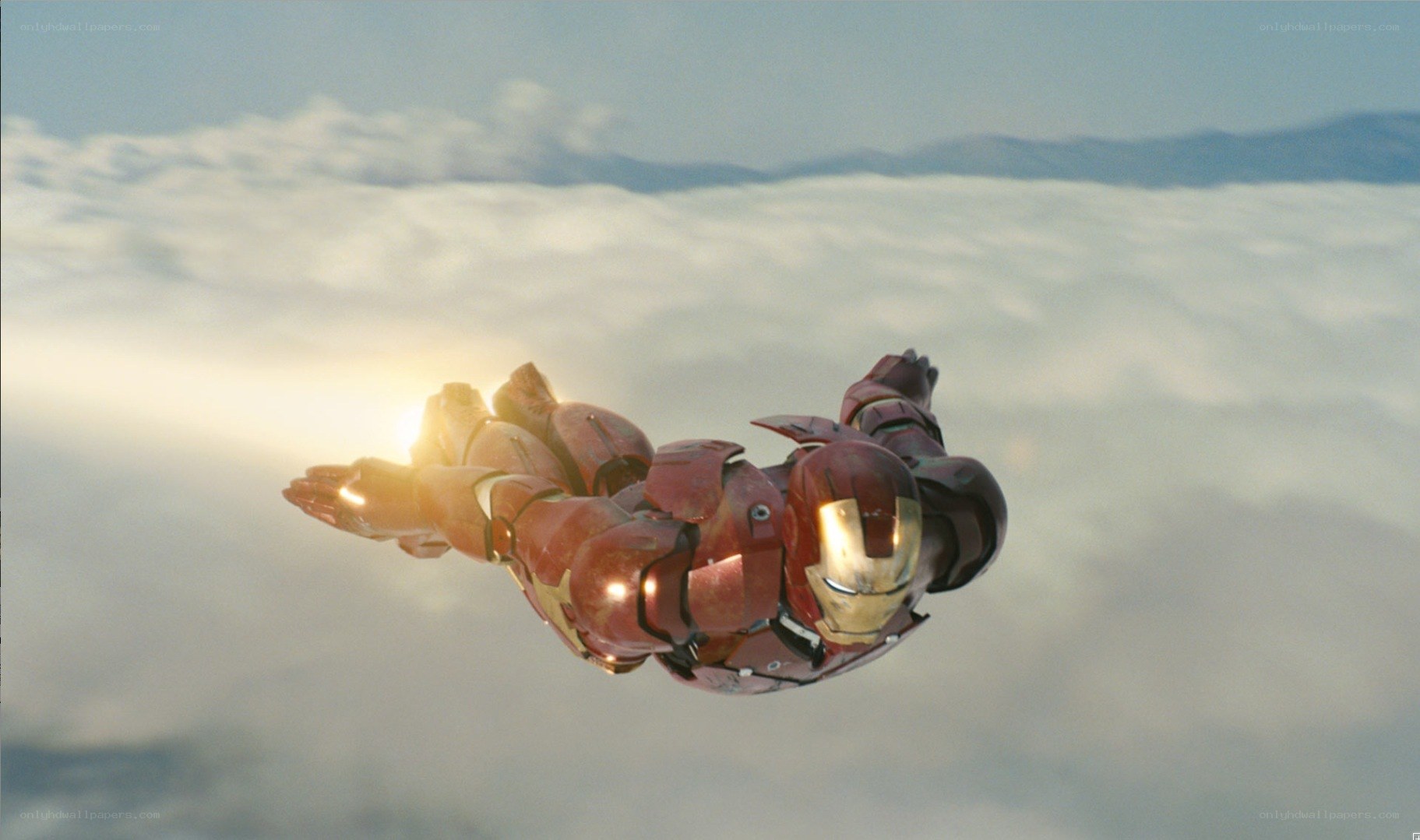 Iron Man flying above clouds