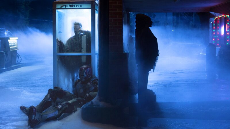 Iron Man in snow at phone booth