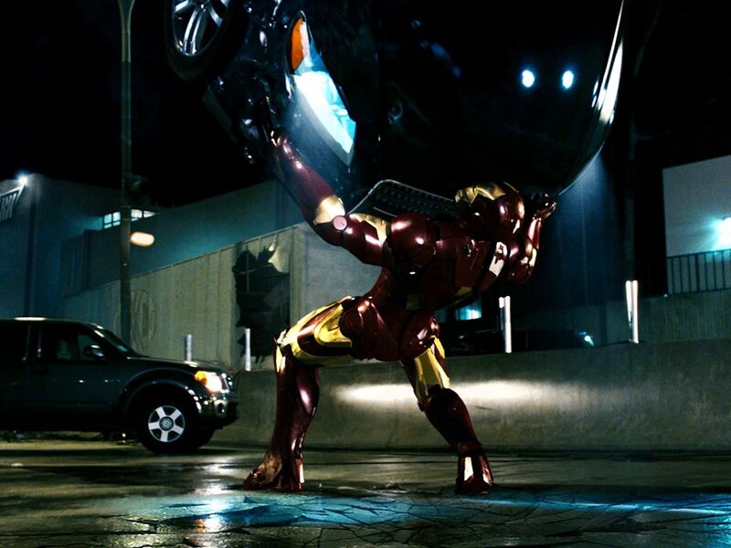 Iron Man lifts car at night