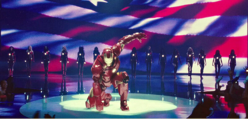 Iron Man on stage with dancers