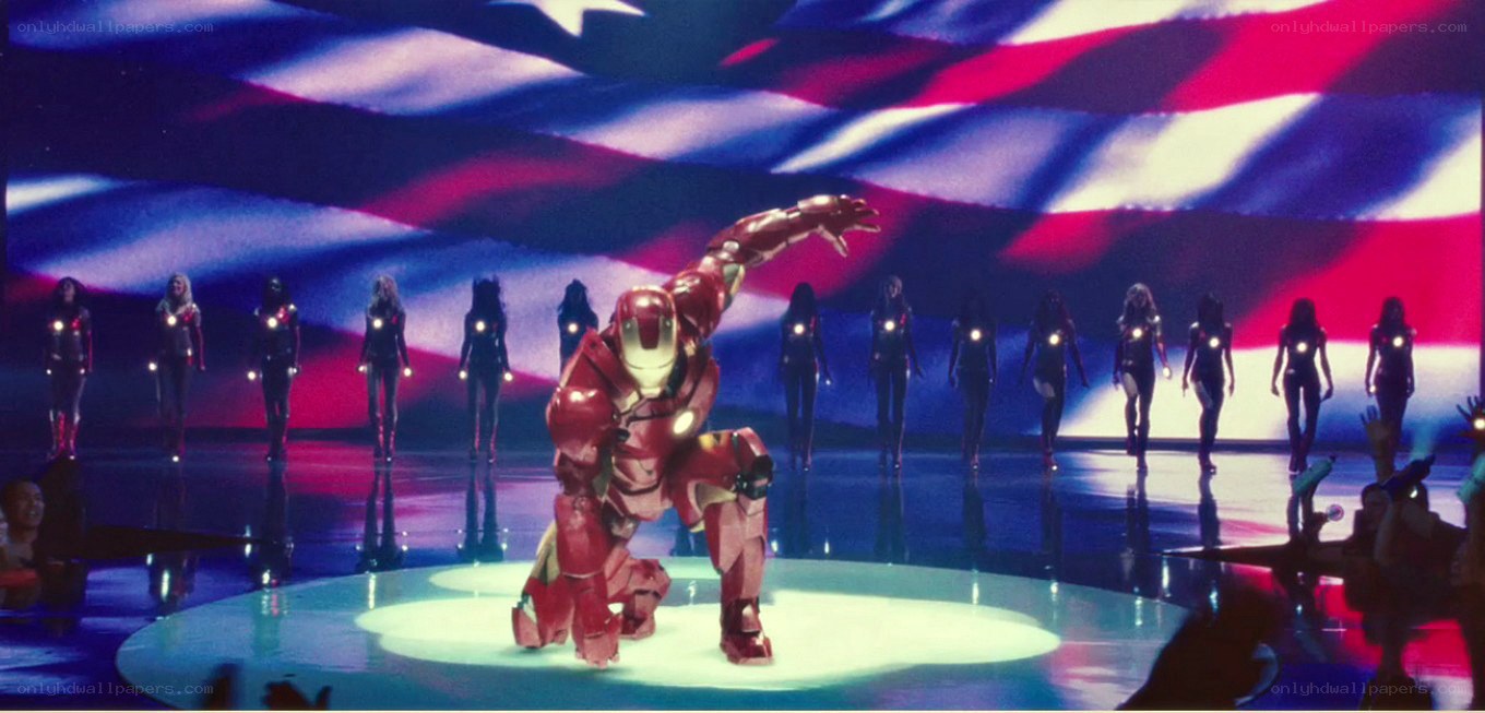 Iron Man on stage with dancers