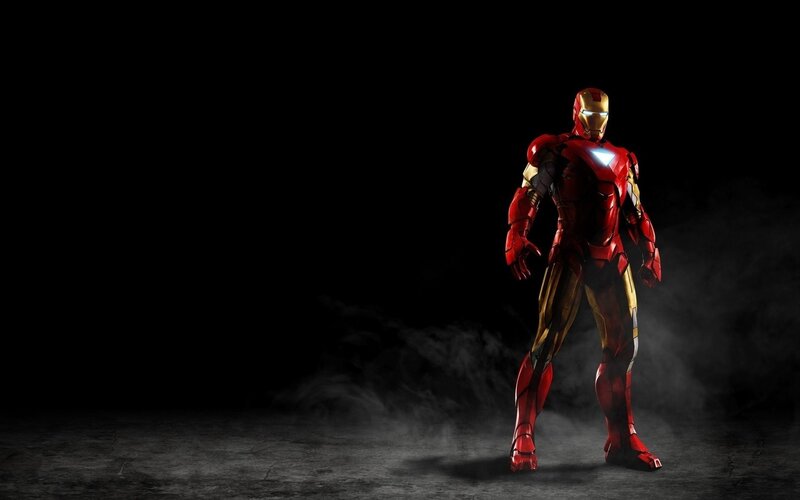 Iron Man stands in the dark