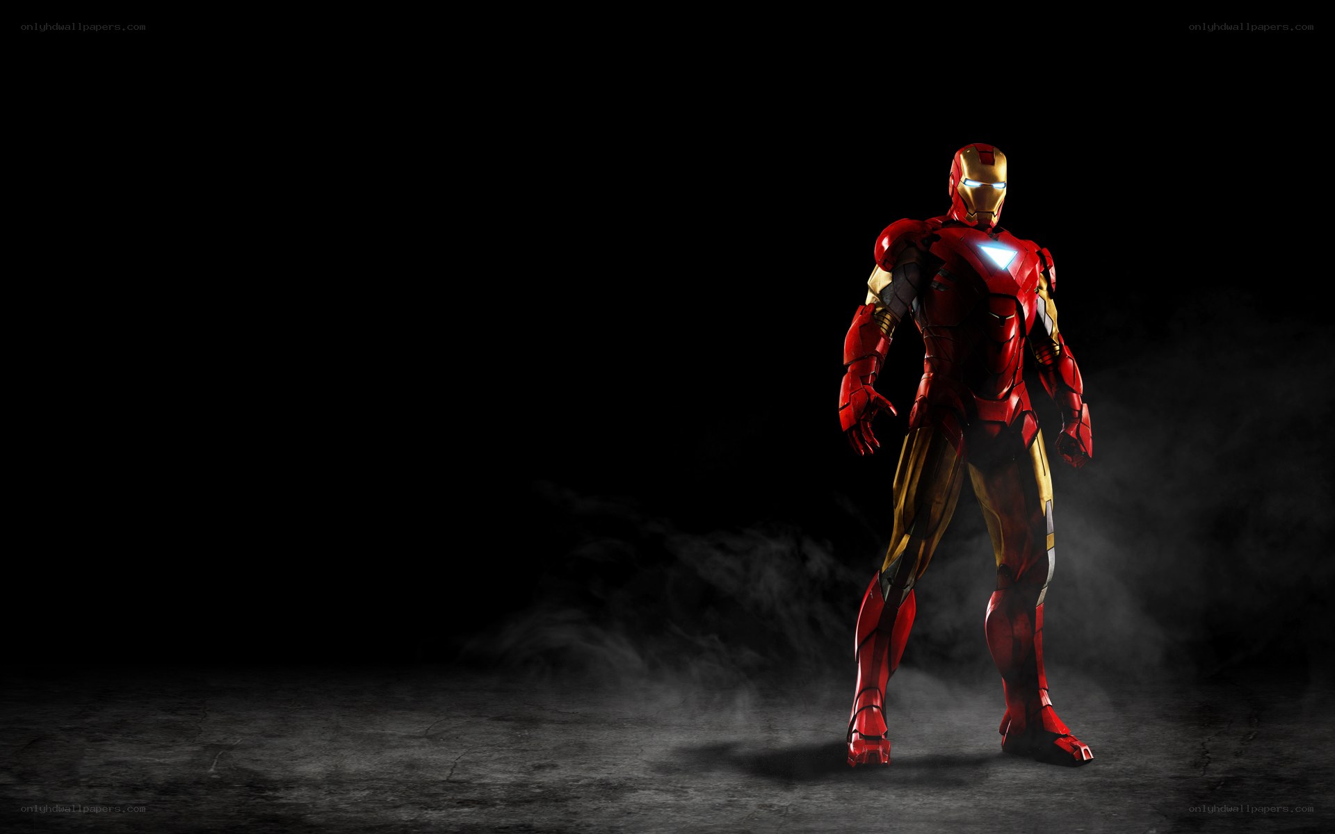 Iron Man stands in the dark
