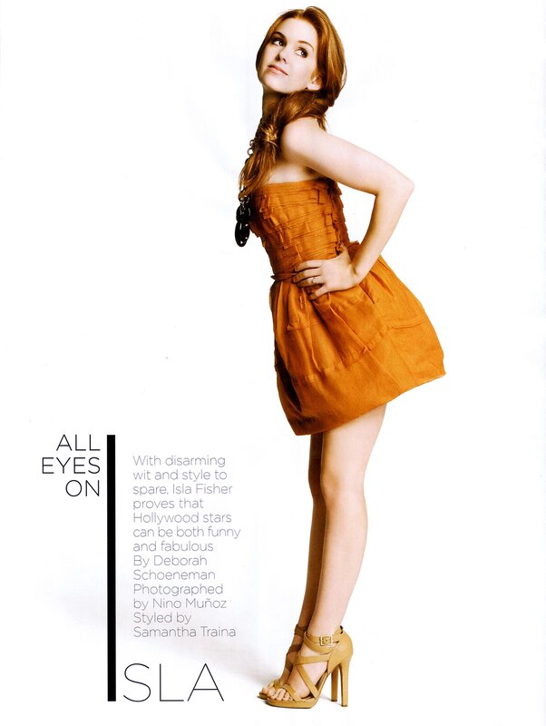 Isla Fisher in orange dress